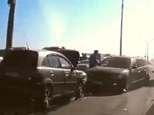 Лобовое столкновение на встречной полосе автодороги N1: КАМАЗ, 'Фольксваген' и 'Киа'